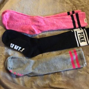 Three pairs of knee high cozy socks